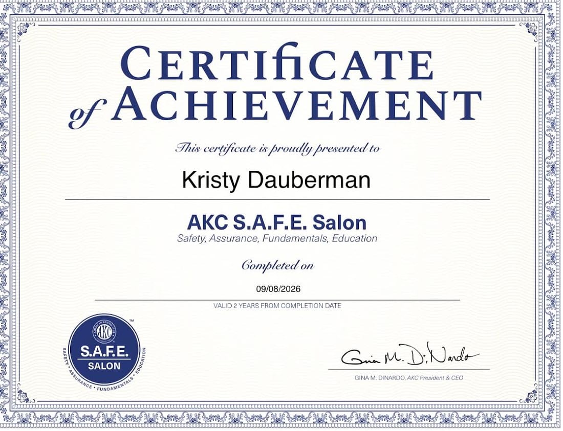 AKC S.A.F.E. Salon Certificate of Achievement presented to owner Kristy Dauberman